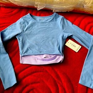 Year of ours thermal club top cloudy blue and lavender. Never worn tags on it